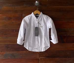 Kemeja anak motif polos warna putih lengan panjang best seller bisa cod Fashion