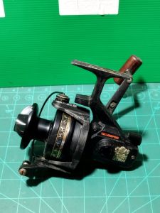 รอกตกปลามือ 2 ญี่ปุ่น olympic carbo spin dx 3000