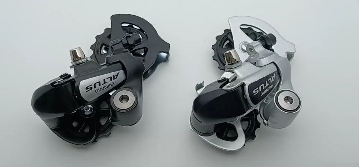Shimano Altus M310 - Jeu De Poulies Dérailleur Arrière 7/8 Vitesses - 13/15 Dents - Compatible VTT Vélo - 10
