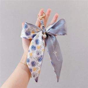 Cute Pearl & Bowtie Design Keychain Pendant