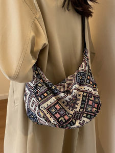 กระเป๋าผ้าใบผู้หญิงทันสมัย ปี 2025 กระเป๋าสะพายข้างผ้าใบสไตล์ชาติพันธุ์ใหม่ที่เป็นเทรนด์ กระเป๋าสะพายข้างแบบสะพายไหล่เดียวขนาดเล็ก