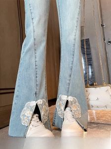 กางเกงยีนส์ทรงขาบานเอวสูงปักลายสไตล์ชาติพันธุ์สำหรับผู้หญิง กางเกงขายาวทรงขาบานเล็ก ฤดูใบไม้ร่วง 2025 กางเกงขายาวทรงลำลอง