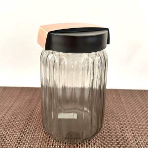 Toples canister kaca bulat ulir Herevin tutup plastik