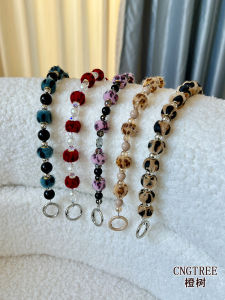 สร้อยข้อมือโซ่ลายเสือดาวทำมือสำหรับโทรศัพท์มือถือ กระเป๋าถือแฟชั่นสำหรับผู้หญิง ทนทานและแข็งแรง เครื่องประดับโทรศัพท์มือถือ