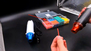 เครื่องเป่าลมร้อน 300W ปืนเป่าลมร้อนบัดกรี เครื่องเป่าความร้อนไฟฟ้า ปืนลมร้อนสำหรับท่อหด หุ้มรถยนต์ งานฝีมือ DIY 220V