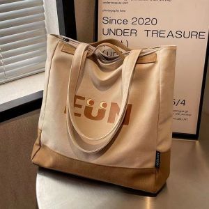 Casual Canvas Triangle Bag กระเป๋าสะพายแฟชั่นผู้หญิงใหม่กระเป๋าถือความจุขนาดใหญ่สําหรับการเดินทางและเรียน