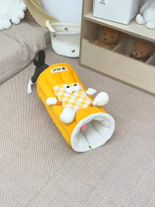 Cozy Pet Cat Tunnel Bed – A tunnel bed and play area all in one. Suitable for all seasons comes with a soft cat mat and a cute big-eye cartoon design providing a comfortable resting spot for your cat.