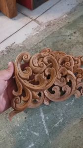 ไม้สักแกะสลัก ลายกนกไทยไม้เลื้อย เป็นงานไม้ดิบไม่ทำสี (carved teak wood) ขนาด กว้าง9xหนา1xยาว7 นิ้ว( inches)ใช่ตกแต่งผนัง บ้าน รีสอร์ท โรงแรม