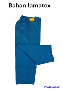 Celana panjang sekolah anak laki-laki warna biru Benhur TK dengan bahan famatex elastis di pinggang saku depan cocok untuk anak.