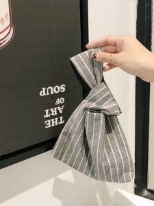 กระเป๋าคาดข้อมือสไตล์ญี่ปุ่นเรียบง่าย กระเป๋าใส่โทรศัพท์มือถือ กระเป๋าใส่เหรียญ กระเป๋าสะพายไหล่แบบลำลอง กระเป๋าคาดข้อมือแบบมีซิป