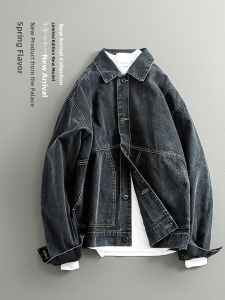 Vintage Washed Denim Jacket with Visible Seams