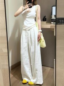 กางเกงขายาวผ้าลินินคอตตอนสีขาวสำหรับผู้หญิงในช่วงฤดูร้อน กางเกงขายาวผ้าไหมน้ำแข็งบางๆ หลวมๆ ลำลอง กางเกงขายาวทรงหลวมๆ ทรงหลวมๆ ทรงหลวมๆ