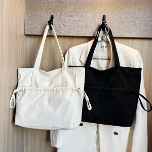 คุณสมบัติของกระเป๋าทำงานผญ กระเป๋าสะพายข้าง กระเป๋าผ้า กระเป๋าสะพายผู้หญิงพร้อมส่ง แฟชั่น กระเป๋าผ้าแคนวาส จุของได้เยอะ สไตล์เกาหลี, เรียบง่าย