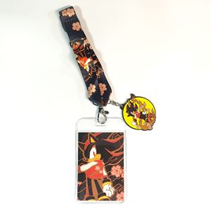 Anime lanyard with cherry blossom patterns a card holder and a charm. Ideal for fans stylish for daily use.