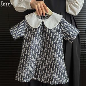 ชุดเดรสฉบับภาษาเกาหลีสำหรับเด็กลายหมีนำเสื้อผ้าเด็กชุดเดรสแขนสั้นผ้าแจ็คการ์ดคอตุ๊กตา2-7ปีพิมพ์ลาย Teron เสื้อผ้าแบบลำลองสำหรับเด็กผู้หญิง