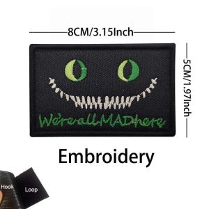 WERE ALL MAD HERE Morale EmblemCheshire Cats Eye Glow On the Dark Reflective PatchesTactical Badges Embroidery Applique