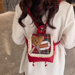 NIkyLundun   กระเป๋าเป้หมีสไตล์วิทยาลัยย้อนยุคสำหรับสาวๆ ดีไซน์สก๊อตและโบว์แต่งแต้ม