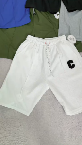 กางเกงขาสั้นทรงหนาสไตล์อเมริกันสำหรับผู้ชายในช่วงฤดูร้อน กางเกงกีฬาบาสเก็ตบอลแบบเย็บแฟชั่น กางเกงขาสั้นทรงตรงหลวมๆ