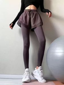 Jiu Mai Yi กางเกงกีฬาขายาวคล้ายใส่สองชิ้นสําหรับฤดูใบไม้ร่วงและฤดูหนาวชุดโยคะสองชั้นผ้ายืดรัดรูปสําหรับผู้หญิงกางเกงฟิตเนสทรงหลวมแห้งเร็ว