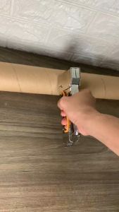 Máy bấm ghim cầm tay Súng bắn ghim cầm tay - KHÔNG cần điện khí nén- Ghim vào gỗ khung tranh tường
