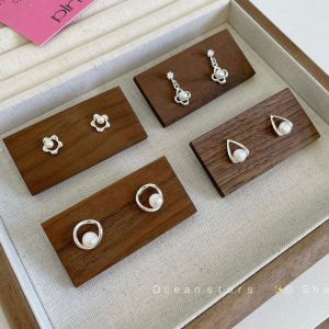 ดอกไม้แฟชั่นของผู้หญิง S925 Beimu ต่างหูมุกเครื่องประดับสำหรับผู้หญิงต่างหูเงินทรงยาวอเนกประสงค์