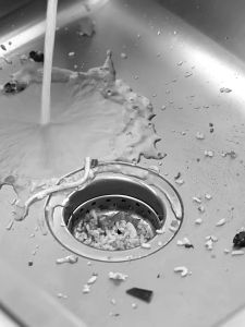 Hộp 100 túi lưới lọc rác bồn rửa bát tặng 1 móc treo dán tường.