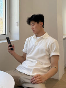 เสื้อโปโลแขนสั้นผู้ชายสไตล์ย้อนยุคสไตล์อเมริกัน ทรงหลวม ผ้าฝ้ายระบายอากาศได้ดี ความยาวปกติ