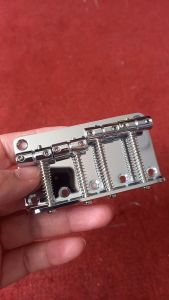 Ngựa bass điện 4 dây hợp kim kẽm bass cầu kích thước 79.5x46.9MM. Phụ kiện đàn guitar