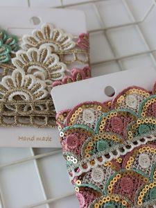 ผ้าลายปักสีชมพูทอง เรียบเงา ระบาย ผ้าปักลายระดับไฮเอนด์ เครื่องประดับเสื้อผ้าจากจีนแผ่นดินใหญ่ แบรนด์ Cottontime