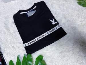 ❗️งานขายดี❗️เสื้อยืดแขนสั้นปักCCตีเทปเนื้ออผ้าคอตตอนทรงตรงใส่ได้ทั้งชายและหญิง