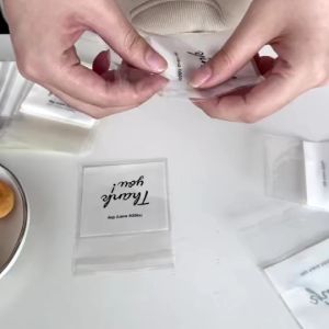 100PCS Mini Transparent Plastic Candy Bag: A Portable & Self Adhesive Snack Packing Solution