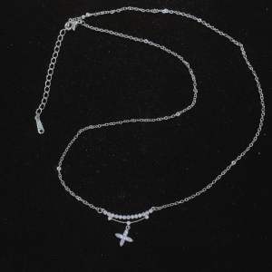 Micro-inlaid zirconium smile X pendant titanium steel necklace