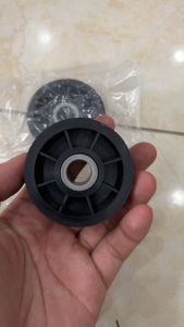 Bánh tỳ căng dây máy sấy Speedqueen