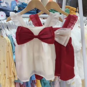 Đầm hai dây đính nơ xinh cho bé gái Đầm xinh đơn giản sang trọng cho bé gái đi tiệc