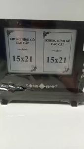 khung thờ gỗ đôi 15x21 gỗ đẹp bền đẹp chắc chắn có 2 màu nâu và đen