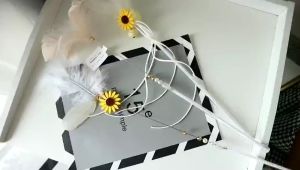 Gậy trêu mèo hoa hướng dương kèm chuông – Đen Ta pet shop