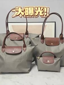 Nylon large medium and small size large capacity long handle single shoulder folding travel bag dumpling bag tower bag