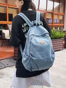 กระเป๋าเป้สะพายหลังผ้าเดนิมขนาดใหญ่สำหรับใส่หนังสือของนักเรียนวัยรุ่นและนักศึกษาใหม่ปี 2024 กระเป๋าสะพายไหล่แบบลำลองสำหรับผู้หญิง