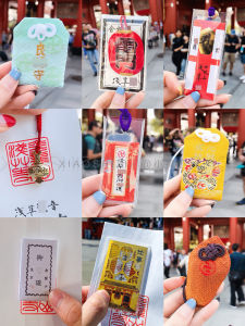 สร้อยข้อมือคู่สไตล์ญี่ปุ่นพร้อมพวงกุญแจโทรศัพท์ กระเป๋าสะพายไหล่ พร้อมเครื่องรางนำโชคสำหรับการเดินทางและสวิงด้านข้าง