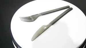 A set of 50 items Black plastic cutlery set knife fork spoon with packaging