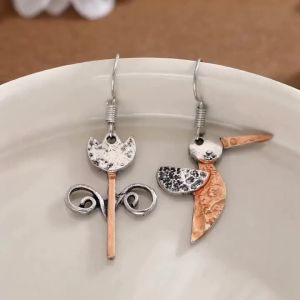 Bohemian Ethnic Style Asymmetrical Two-Color Plant Bird Pendant Earrings for Ladies Suitable for Daily Date Outfits.