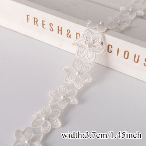 Stunning! Flower - pearl beaded lace ribbon with beaded fringe. Ideal for handmade dresses adding unique charm.