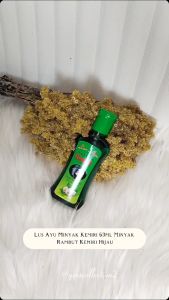 Lus Ayu Minyak Rambut Kemiri 63 ml + Vitamin E: Solusi Menumbuhkan & Memanjangkan Rambut