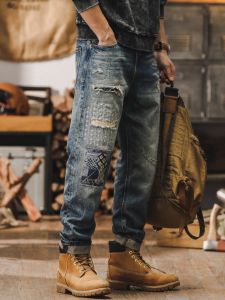 กางเกงยีนส์ทรงหลวมสไตล์อเมริกันสตรีทผสมชาติพันธุ์สำหรับผู้ชาย กางเกงขายาวทรงหลวมสไตล์ลำลองพร้อมรอยขาด ทรงหลวม ทรงหลวม