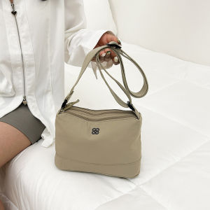 กระเป๋าสะพายไหล่ความจุขนาดใหญ่ที่ผ่อนคลายและเรียบง่ายสําหรับผู้หญิงที่มีรูปลักษณ์หรูหรา กระเป๋าผ้าแคนวาสน้ําหนักเบาที่ใช้งานได้หลากหลายและมีระดับ