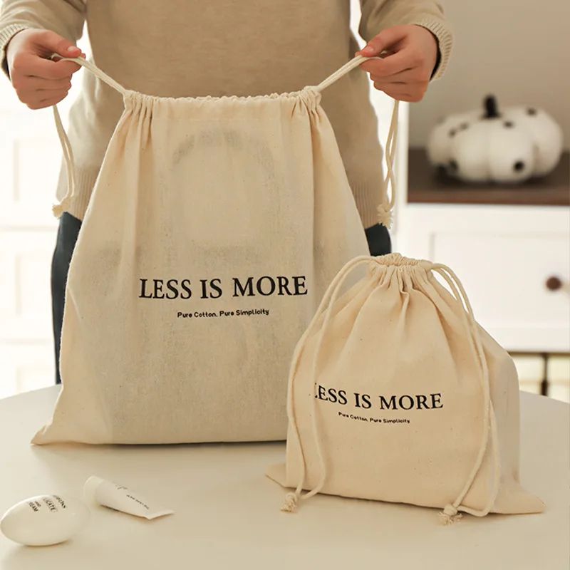 Saco de armazenamento com cordão em algodão puro, bolsa multifuncional para bagagem de viagem, organizador de objetos diversos para casa à prova de poeira.
_voghion.com
