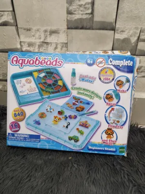 Affordable Aquabeads Beginner’s Studio Kids Crafts and Activities Complete Bead Art Kit for Ages 4+ 840 Plastic Round Beads in Multi Colors Water-Activated Bead Craft Kit