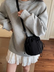 New Mini Bucket Bag Casual Canvas Travel Lightweight Drawstring Phone Bag Crossbody Bag for Daily Use Soft Washable Pure Color