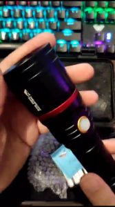 Senter LED Smiling Shark E221: 3 Mode Cahaya, Zoom, Jarak Jauh, Tahan Lama & Charger USB