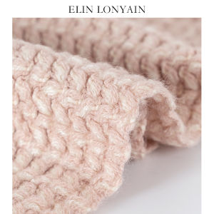 ELIN LONYAIN | Modern Luxe Pink Tassel Throw Blanket